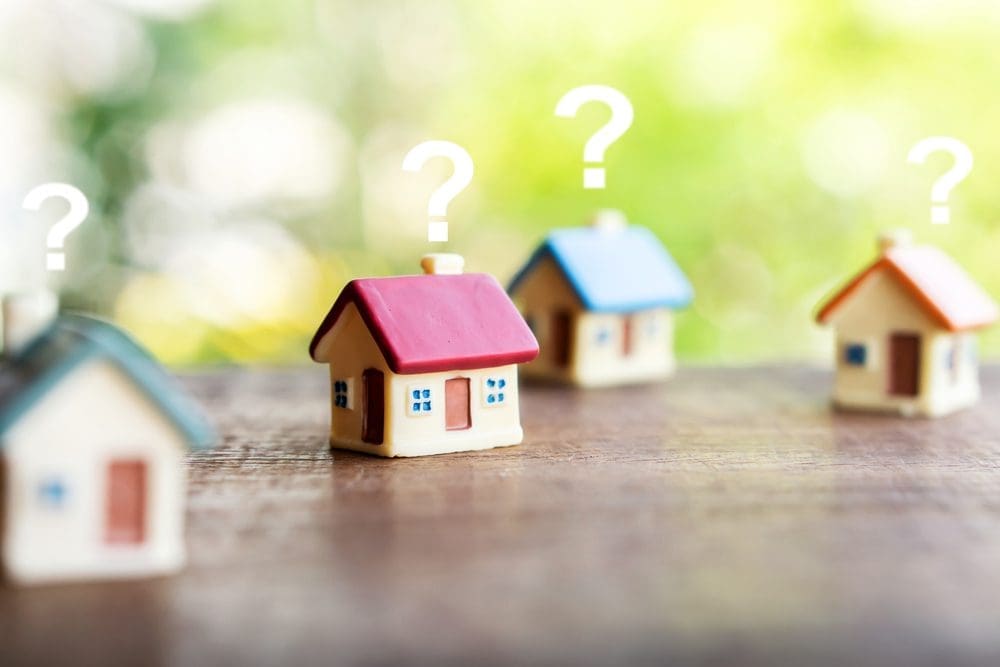 Miniature,House,Model,With,Question,Mark,,Looking,For,New,Home,