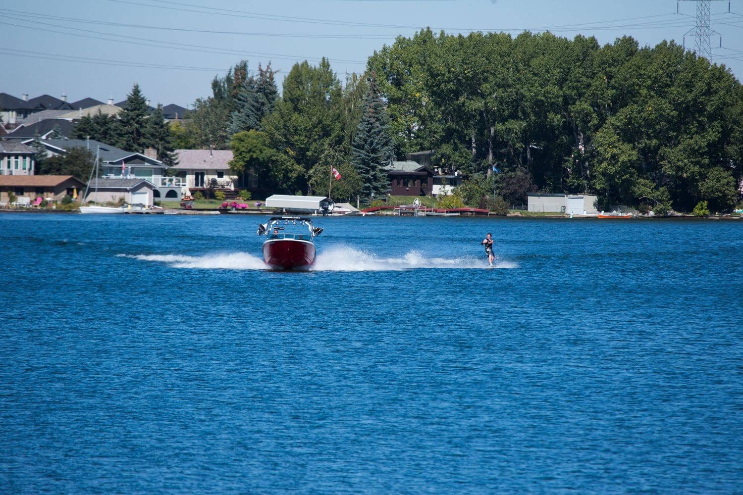boat and wakeboard on chestermere lake
