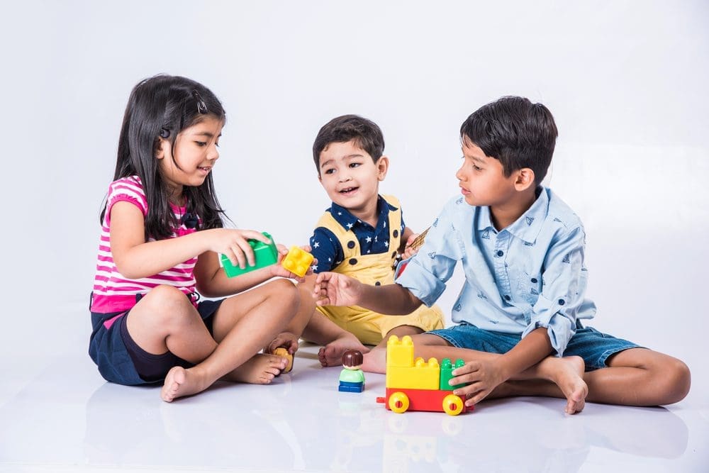 Cute,Little,Indian/asian,Kids,Playing,With,Toys,Or,Blocks,And